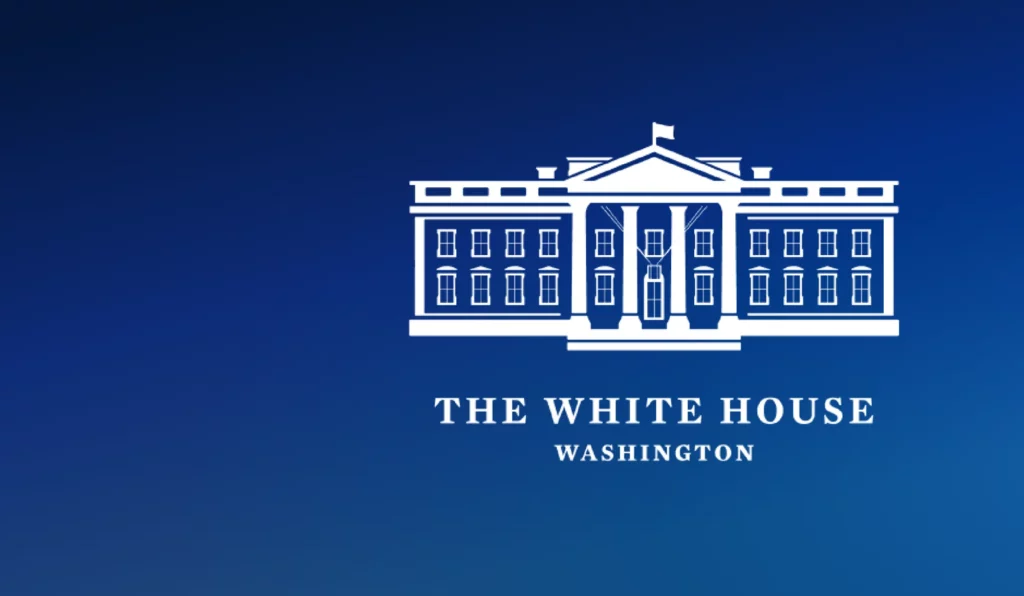 The White House logo knocked-out on a blue background