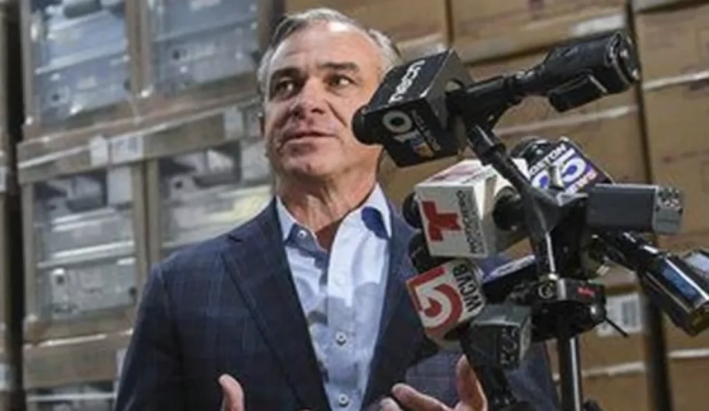 Man giving an interview on broadcast television