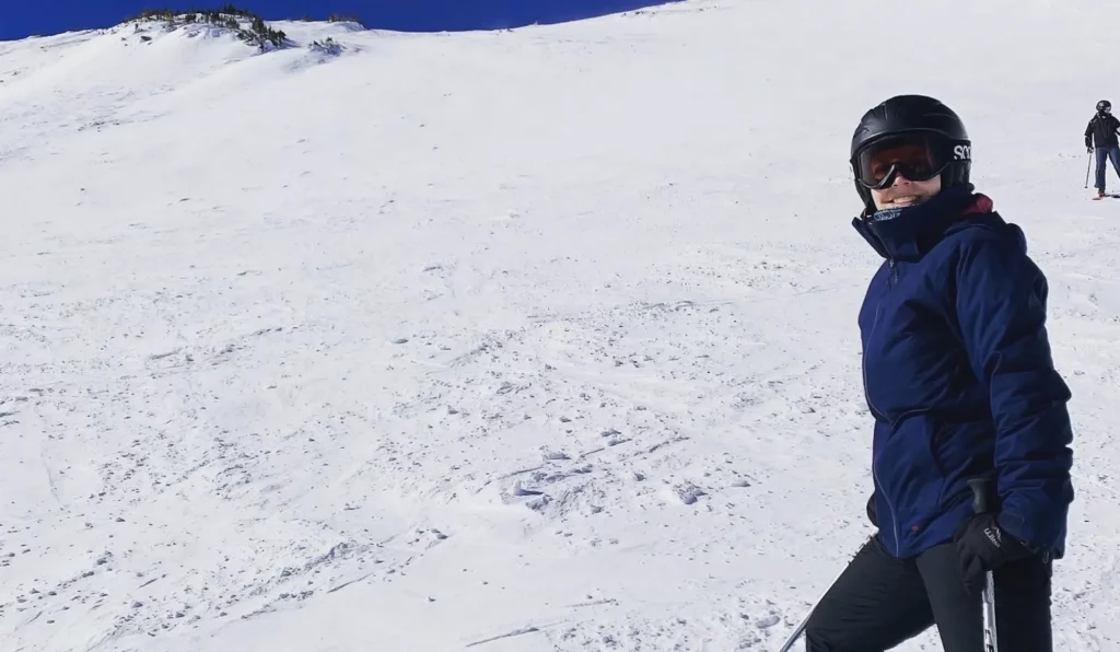 Molly Silvia skiing on a snow covered mountain