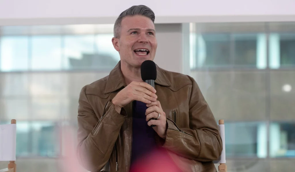 David Knapp speaking into a microphone