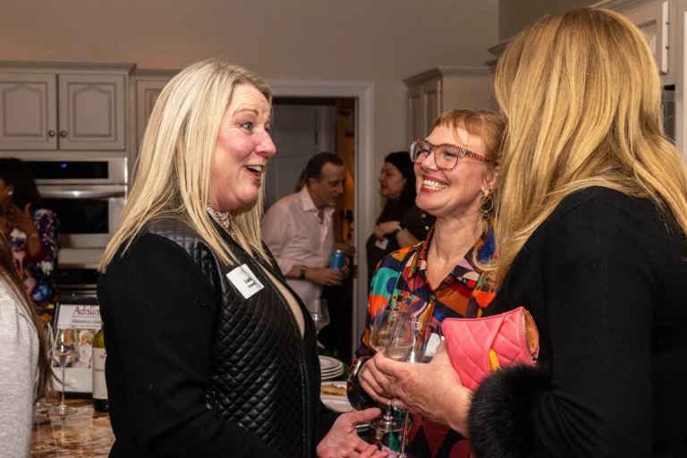 Women talking and laughing at the Chief Networking Evening