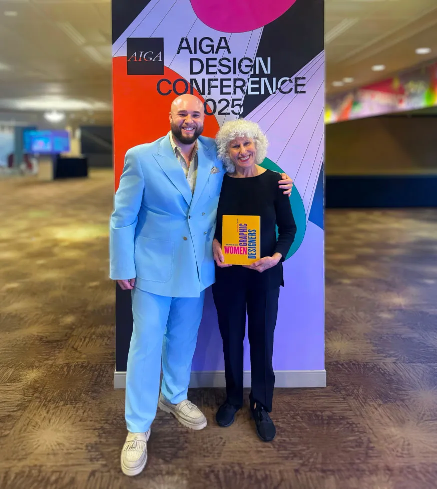 Joseph Soto with former MassArt Professor, Elizabeth Resnick, attending the AIGA Design Conference
